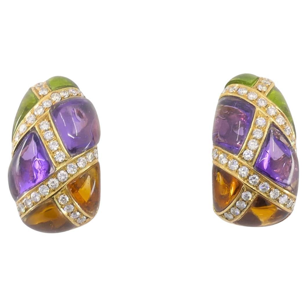 Bvlgari Vintage Bulgari Huggie Earrings Gold Diamond Gemstones: Title: Bvlgari Vintage Bulgari Huggie Earrings Gold Diamond Gemstones Description: About the Item These Bulgari earrings are crafted in 18k gold and showcase the house’s bold approach to color a