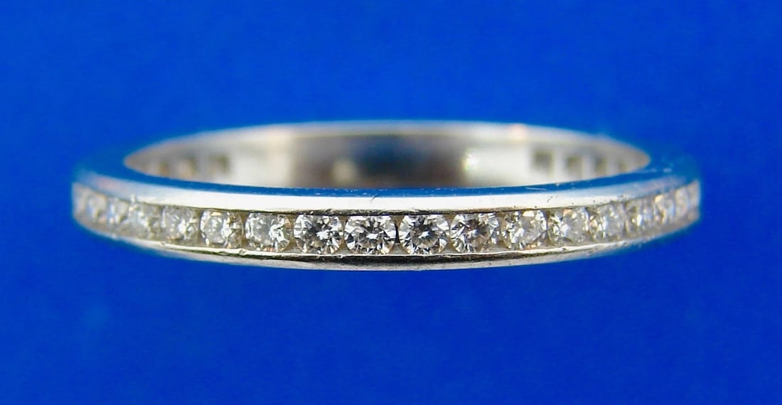 Tiffany & Co. Platinum and Diamond Eternity Band Ring: Title: Tiffany & Co. Platinum and Diamond Eternity Band Ring Description: Tiffany & Co. Platinum and Diamond Eternity Band Ring · Wonderful ring that is a great addition to your collection. 