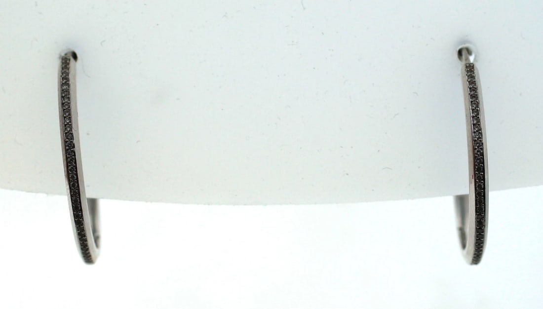 C.1990 14 KT WHITE GOLD DIAMOND HOOP EARRINGS 1.20CTS TIMELESS: Title: C.1990 14 KT WHITE GOLD DIAMOND HOOP EARRINGS 1.20CTS TIMELESS Description: 14K WHITE GOLD DIAMOND PAVE HOOP EARRINGS C.1990 STYLISH HOOP EARRINGS WEIGHT 7.7 G DIAMETER 1'' WIDTH 1.5-2 MM