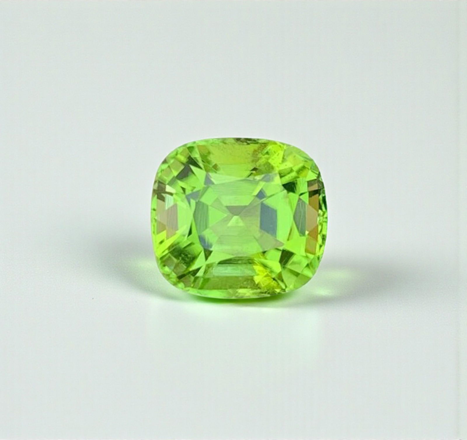 Cushion Cut Peridot Gemstone: Natural August Birthstone, Pakistan (4.24 carats): Materials: Gemstone: Peridot Carat weight: 4.24 Natural Peridot Gemstones, Cushion Cut Peridot Loose Gemstone From Pakistan, August Birthstone weight : 4.24 carat Dimensions : 11*7.5*5 mm Shape : Cusi