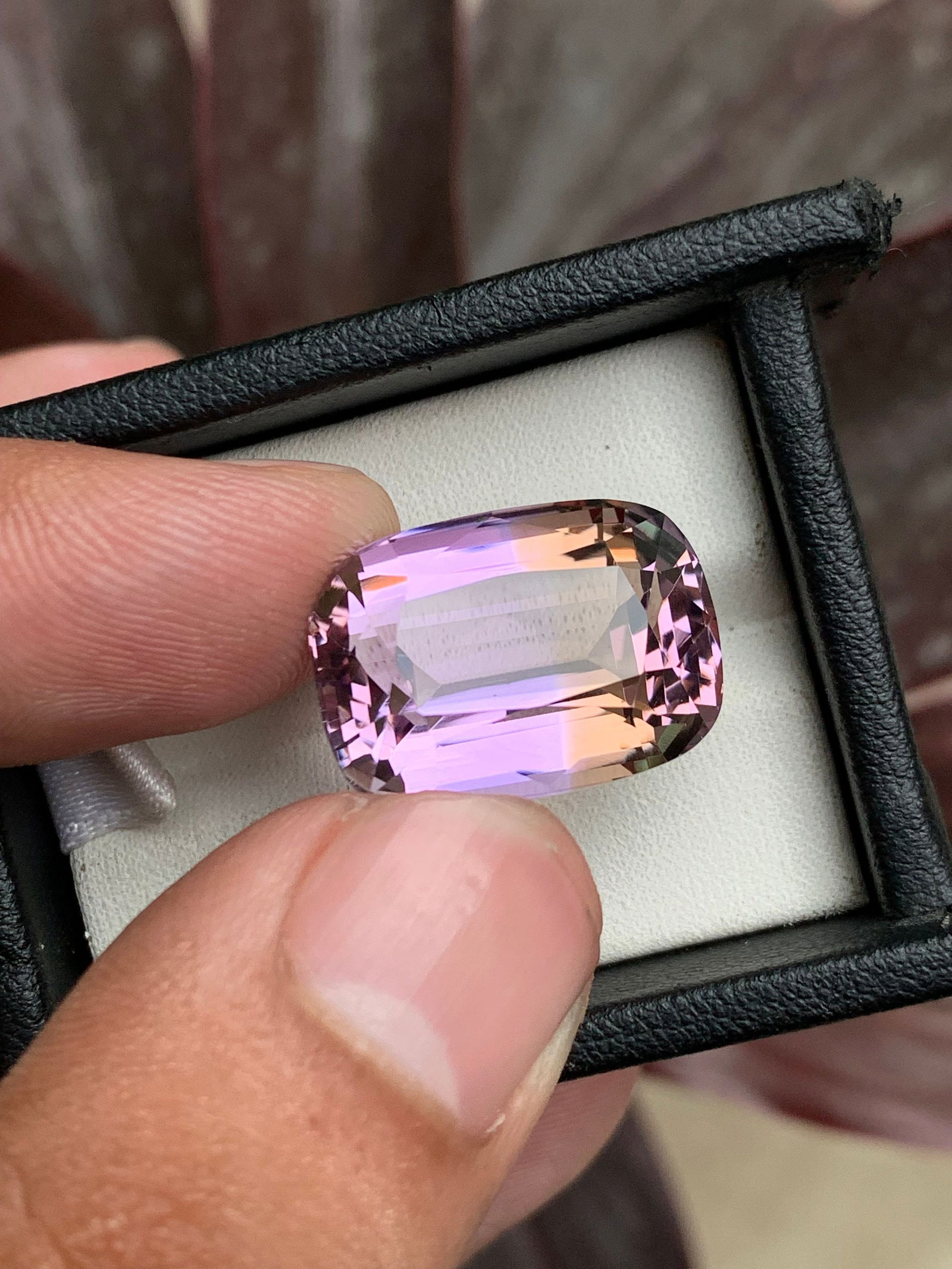 Cushion Cut Ametrine Gemstone: Bi-Color Purplish Yellow, 22.60 CT: Materials: Gemstone: Ametrine Carat weight: 22.60 About this item Discover the allure of our exquisite log cushion-cut natural purplish orange ametrine loose gemstone. Radiating warmth and