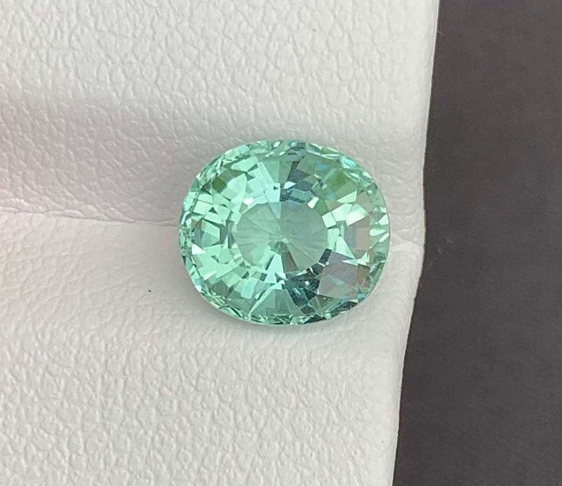Cyan Blue Tourmaline Gemstone: Natural October Birthstone, Africa (2.73 CT): Materials: Gemstone: Tourmaline About this item Cyan Blue Tourmaline Gemstone: Natural October Birthstone, Africa Weight : 2.73 Carat Dimensions : 8.000 * 7.800 * 5.000 mm Shape : Fancy Cushion Cut Cl