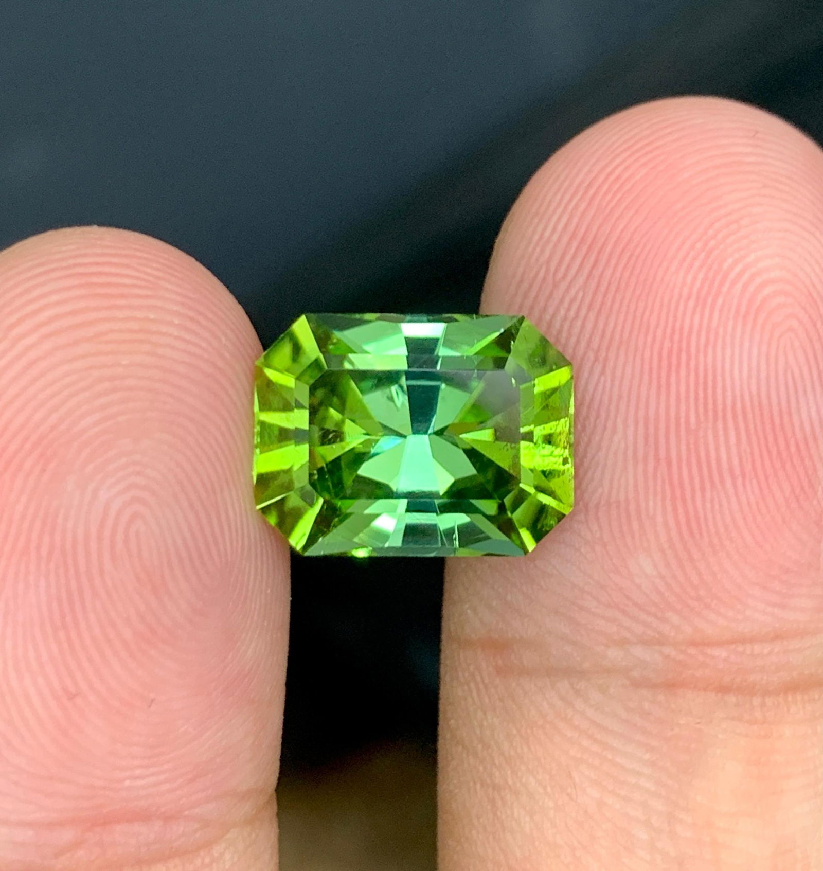 Mint Green Tourmaline Gemstone: 6.50 Carat Radiant Cut, Afghanistan Origin: Materials: Gemstone: Tourmaline Carat weight: 6 About this item Weight : 6.50 CT Dimensions : 12.8 x 9.7 x 7 MM Shape : Radiant Cut Clarity : VVS Color : Mint Green ( Jaba Green ) Treatment : None Ori