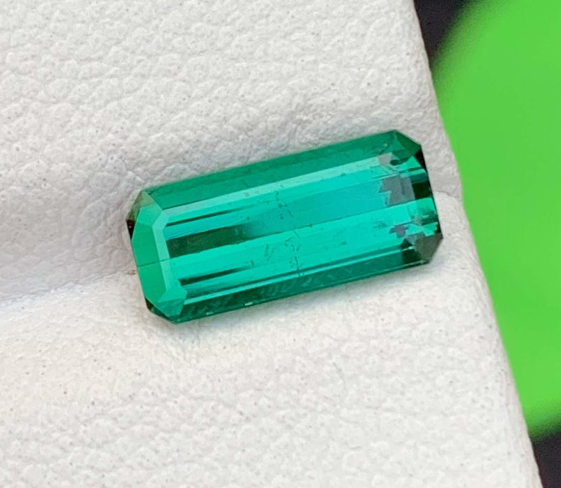 Blue Green Tourmaline Gemstone: Natural October Birthstone, Africa (2.36 CT): Materials: Gemstone: Tourmaline About this item Blue Green Tourmaline Gemstone: Natural October Birthstone, Africa Weight : 2.36 Carat Dimensions : 7.600 * 6.500 * 4.800 mm Shape : Fancy Cut