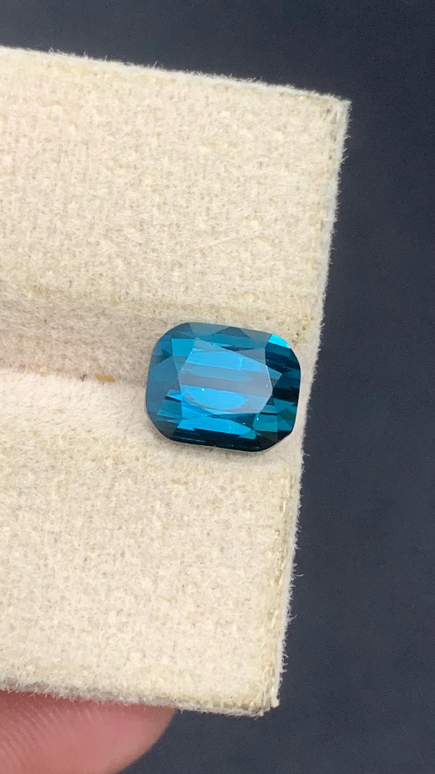 Ring Size Natural Indicolite Blue Cushion Cut Tourmaline Gemstone From Afghanistan - 2.30 Carat: Materials: Gemstone: Tourmaline Carat weight: 2.30 Weight : 2.30 Carat Dimension : 7.8*6.2*5 mm Shape : Cushion Cut Clarity : VVS Color : Indicolite Blue Treatment : None Origin : Afghanistan Hardness