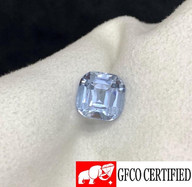 Aquamarine Gemstone: 9.5 Carat Cushion Cut March Birthstone: Materials: Gemstone: Aquamarine Carat weight: 9.50 • Weight : 9.50 carat • Dimension : 12.97*12.84*8.85 mm • Color: Blue • Clarity : Loupe Clean • Shape : Cushion