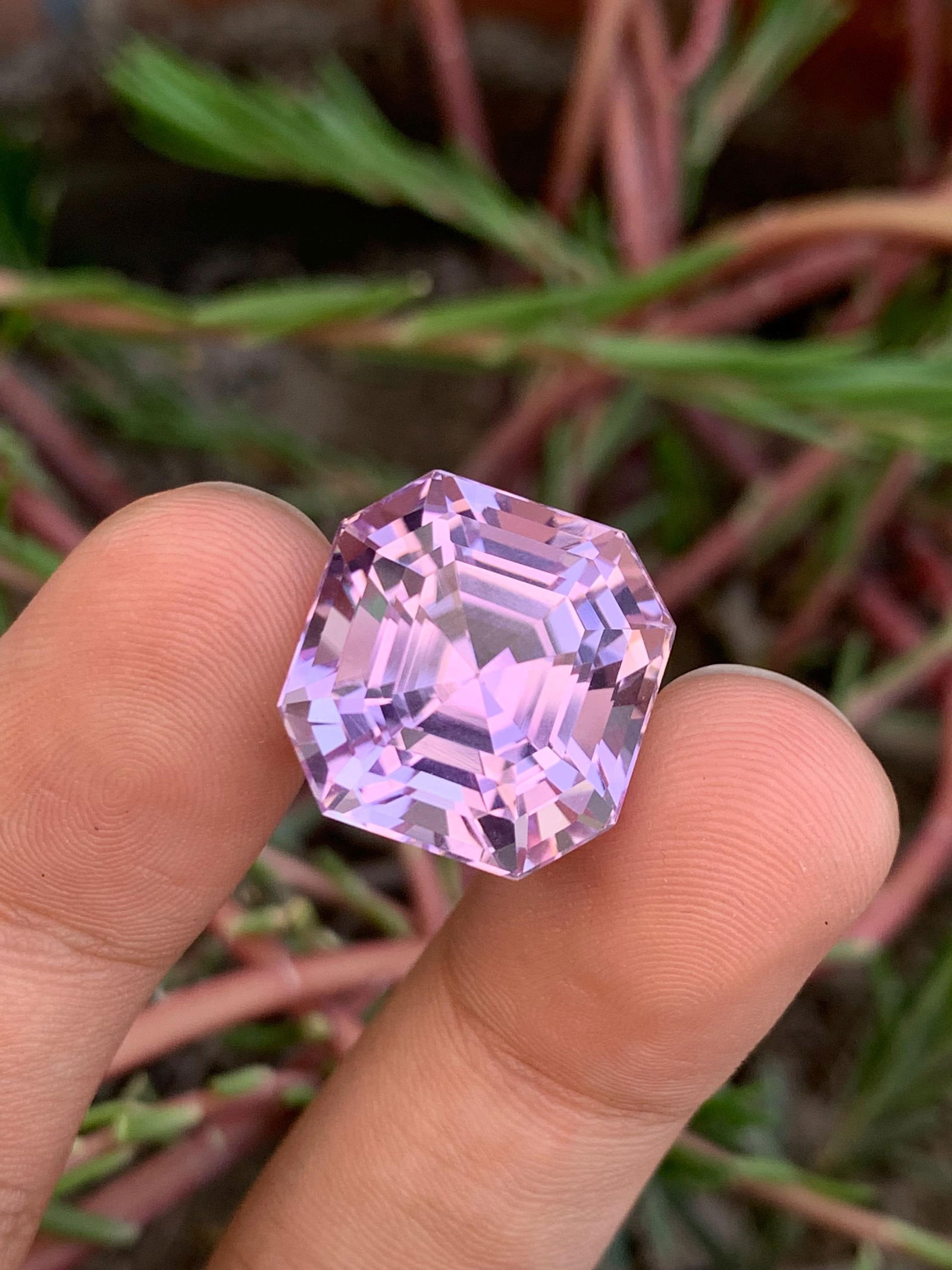 Pink Kunzite Gemstone: 31.30 Carat Asscher Cut, Afghanistan Origin: Materials: Gemstone: Kunzite Carat weight: 31.30 : • Weight : 31.30 carat • Dimension : 17*17*15 mm • Shape : Asscher • Colour : Pink • Clarity : Loupe Clean • Orig
