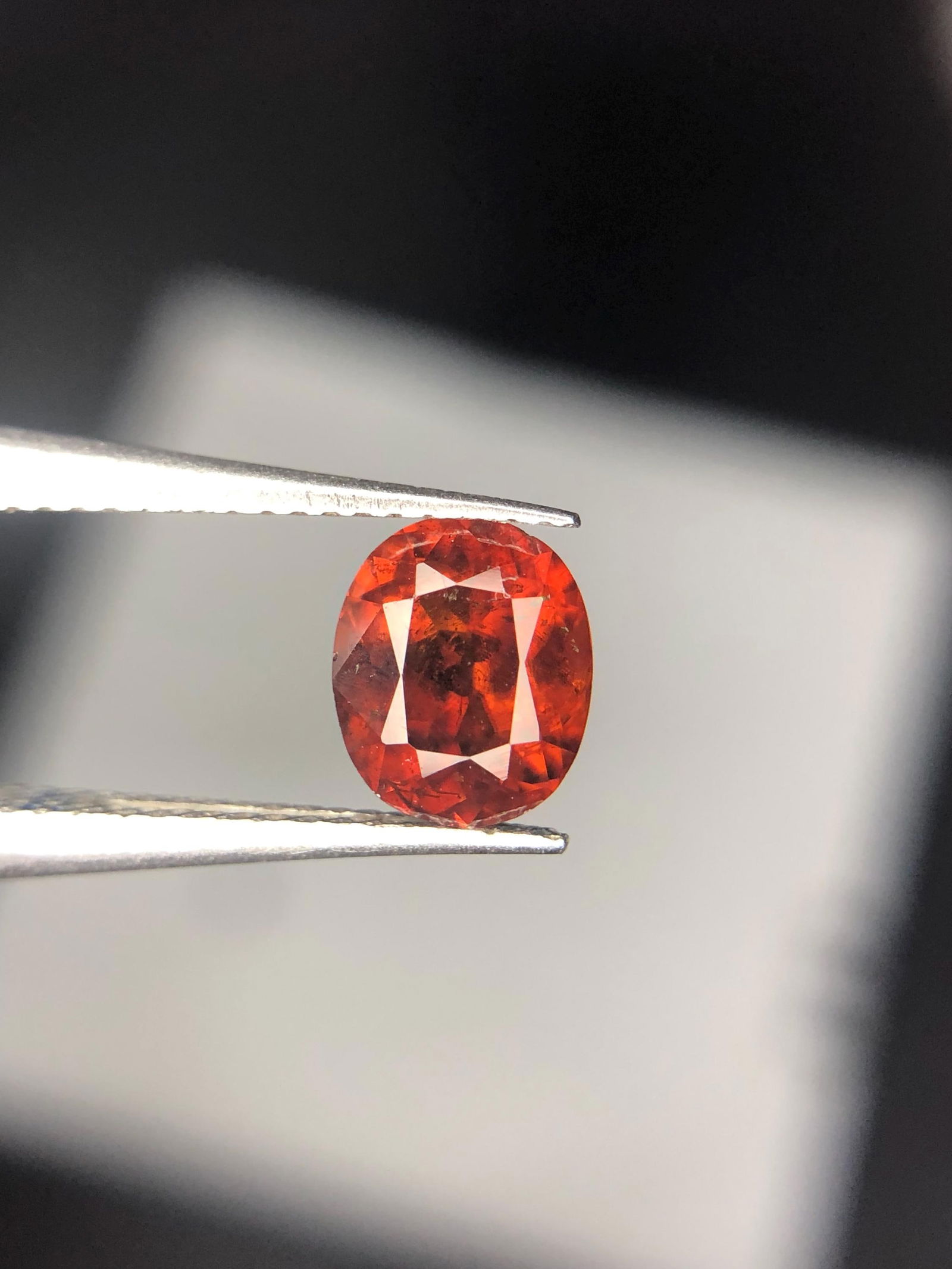 Rare Orangish Brown Bastnasite Gemstone: Oval Cut, 0.85 Carat: Materials: Bastnaesite, gemstone, loosegemstone, cut stone, facated stone Carat weight: 0.85 This one of a kind and uncommon 1.50 carat natural orange cushion cut loose gemstone is a gorgeous item