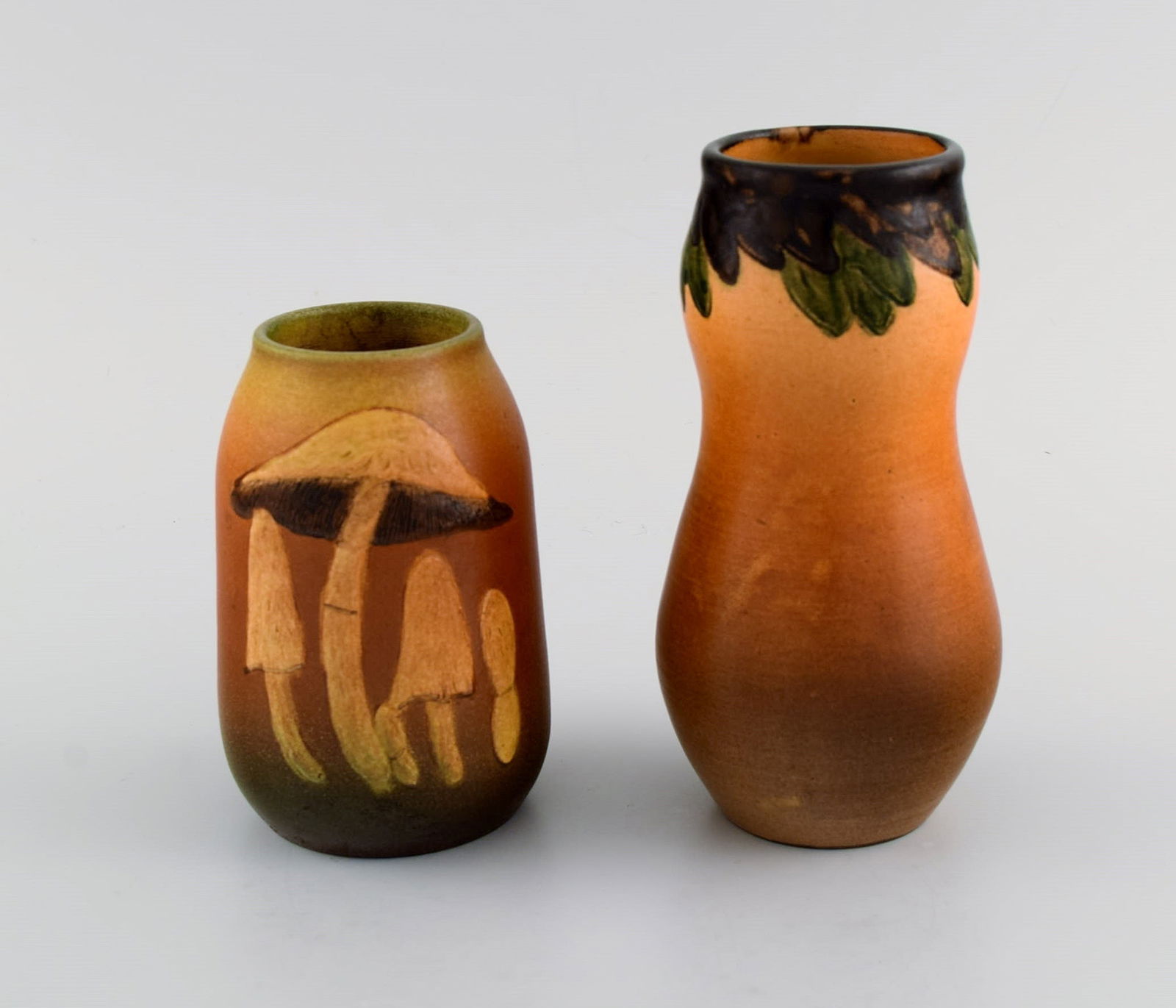 Ipsen's, Denmark. Two vases in hand-painted and glazed ceramics. Mushrooms and foliage. 1920s / 30s. - 2