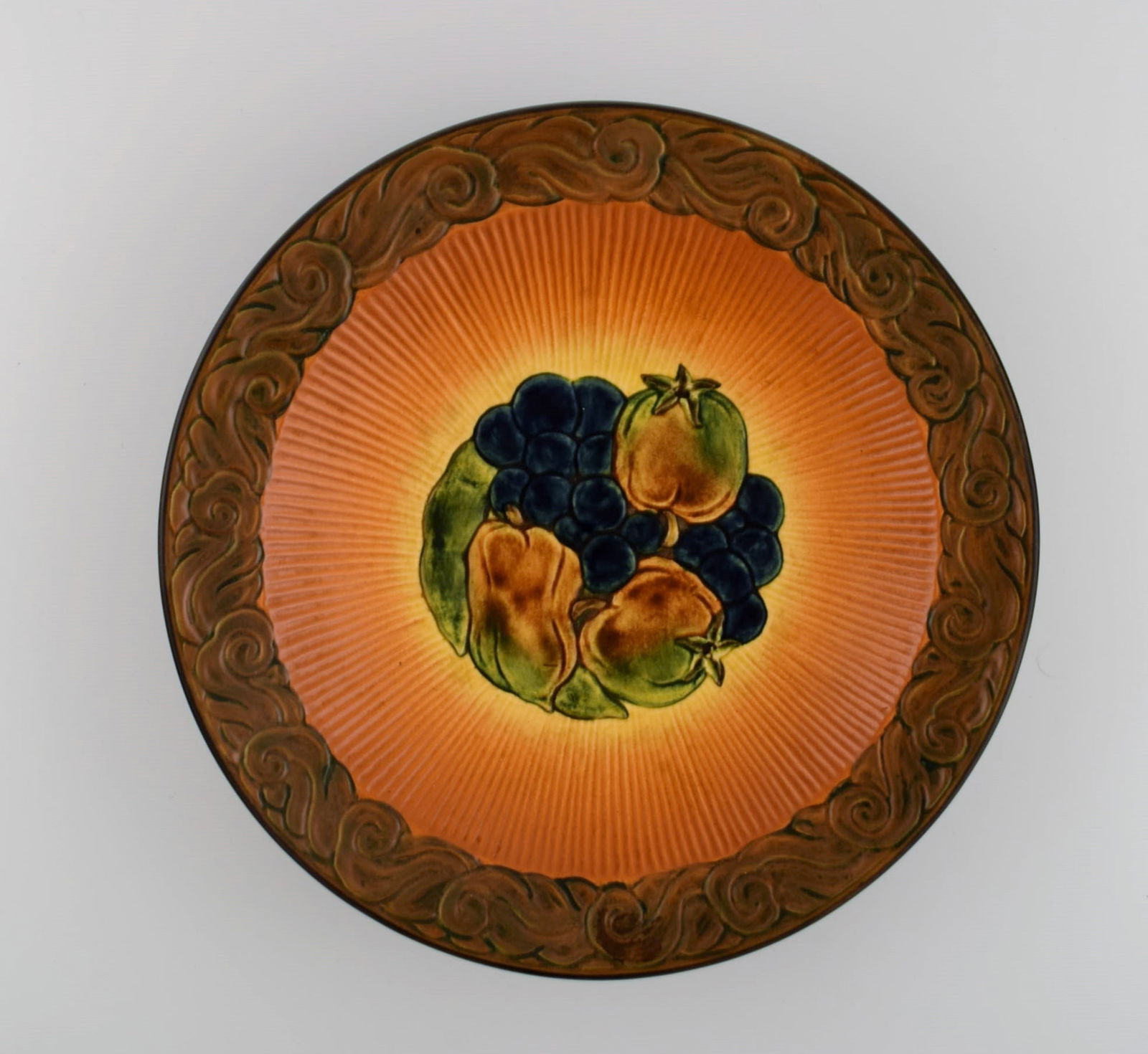 Ipsen's, Denmark. Round bowl / dish in glazed ceramics with hand-painted fruits. 1920s / 30s. Model: Title: Ipsen's, Denmark. Round bowl / dish in glazed ceramics with hand-painted fruits. 1920s / 30s. Model number 119. Description: Ipsen's, Denmark. Round bowl / dish in glazed ceramics with
