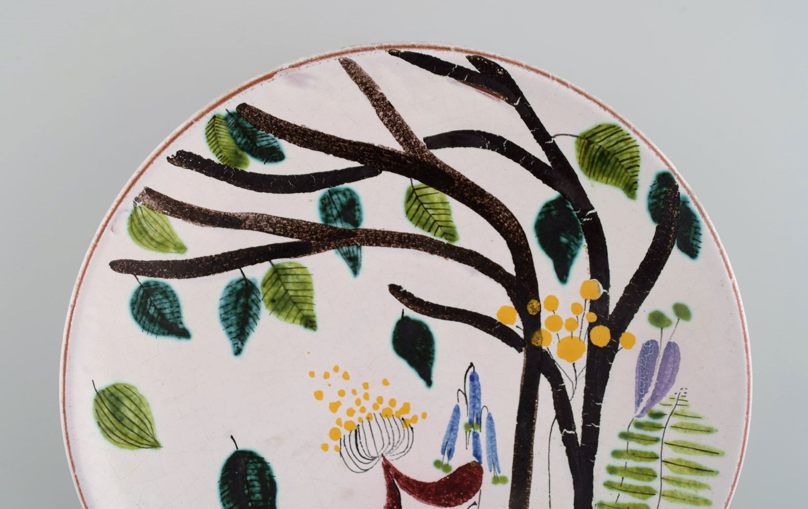 Stig Lindberg for Gustavsberg Studiohand. Round dish in glazed faience with hand-painted flowers. - 2
