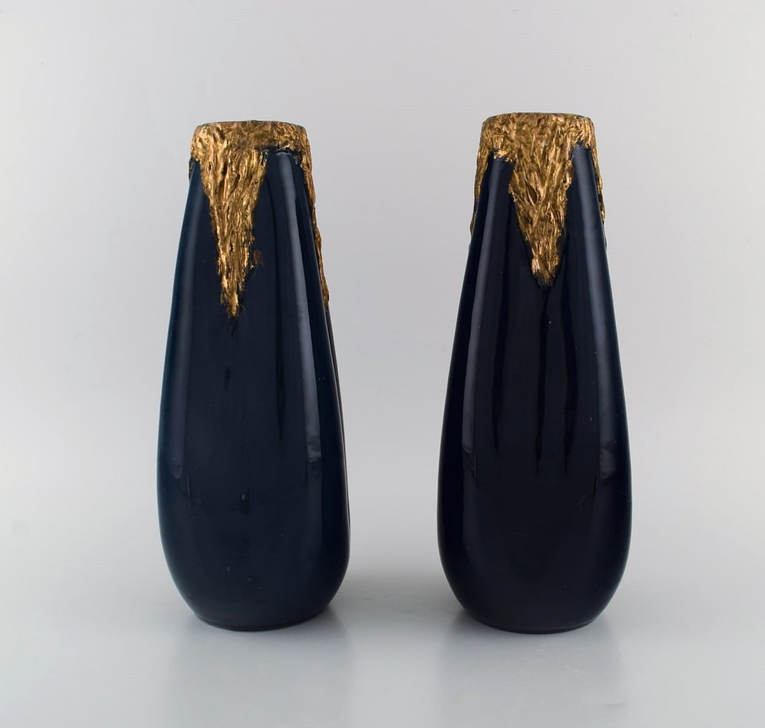Pierre Perret for Vallauris. A pair of antique vases in glazed ceramics. Beautiful glaze in deep: Title: Pierre Perret for Vallauris. A pair of antique vases in glazed ceramics. Beautiful glaze in deep blue shades and hand-painted gold decoration. Early 20th century. Description: Pierre Perret