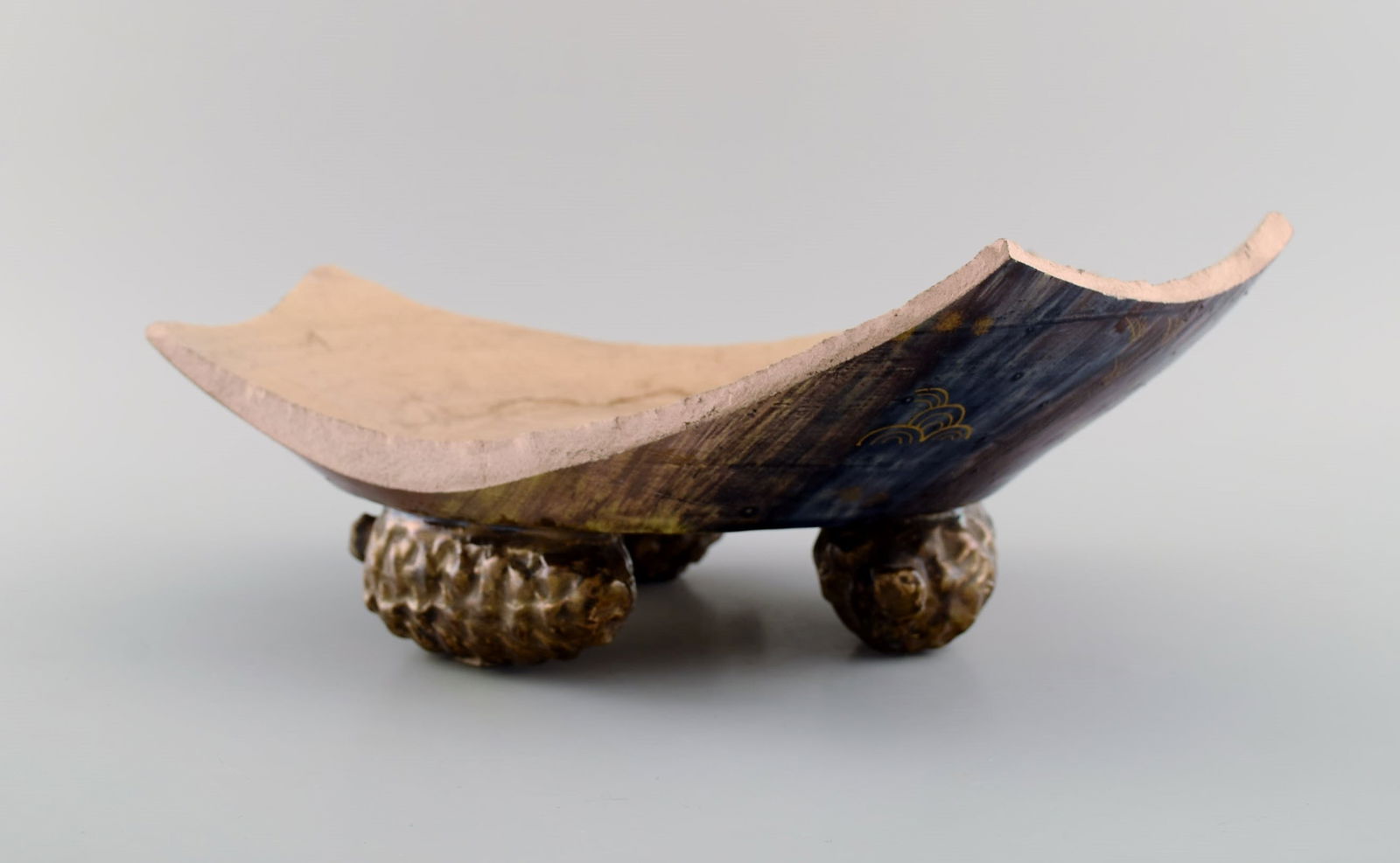 Emile Gallé for St. Clement, Nancy. Antique art nouveau bowl in hand-painted faience with feet: Title: Emile Gallé for St. Clement, Nancy. Antique art nouveau bowl in hand-painted faience with feet shaped like spruce cones. Approx. 1880. Description: Emile Gallé for St. Clement,