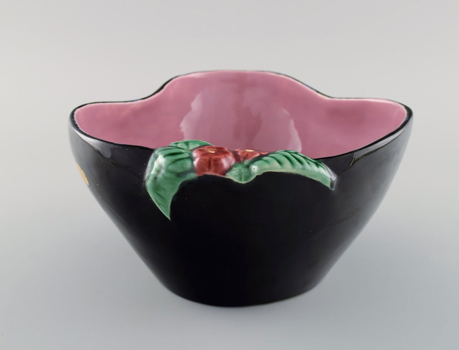 French studio ceramicist. Bowl in glazed ceramics modeled with flowers. Pink interior glaze. Late: Title: French studio ceramicist. Bowl in glazed ceramics modeled with flowers. Pink interior glaze. Late 20th century. Description: French studio ceramicist. Bowl in glazed ceramics modeled with