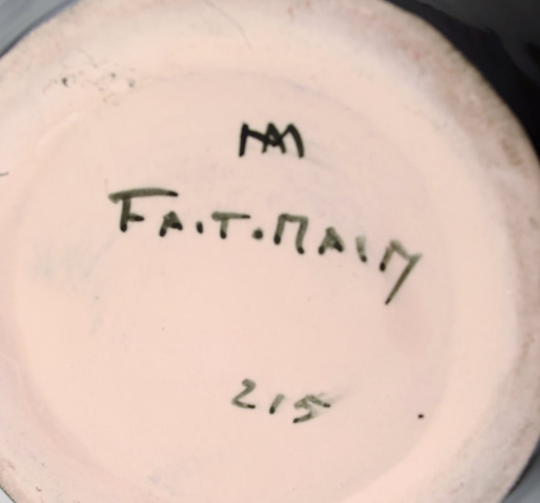 French studio ceramicist. Bowl in glazed ceramics modeled with flowers. Pink interior glaze. Late - 6