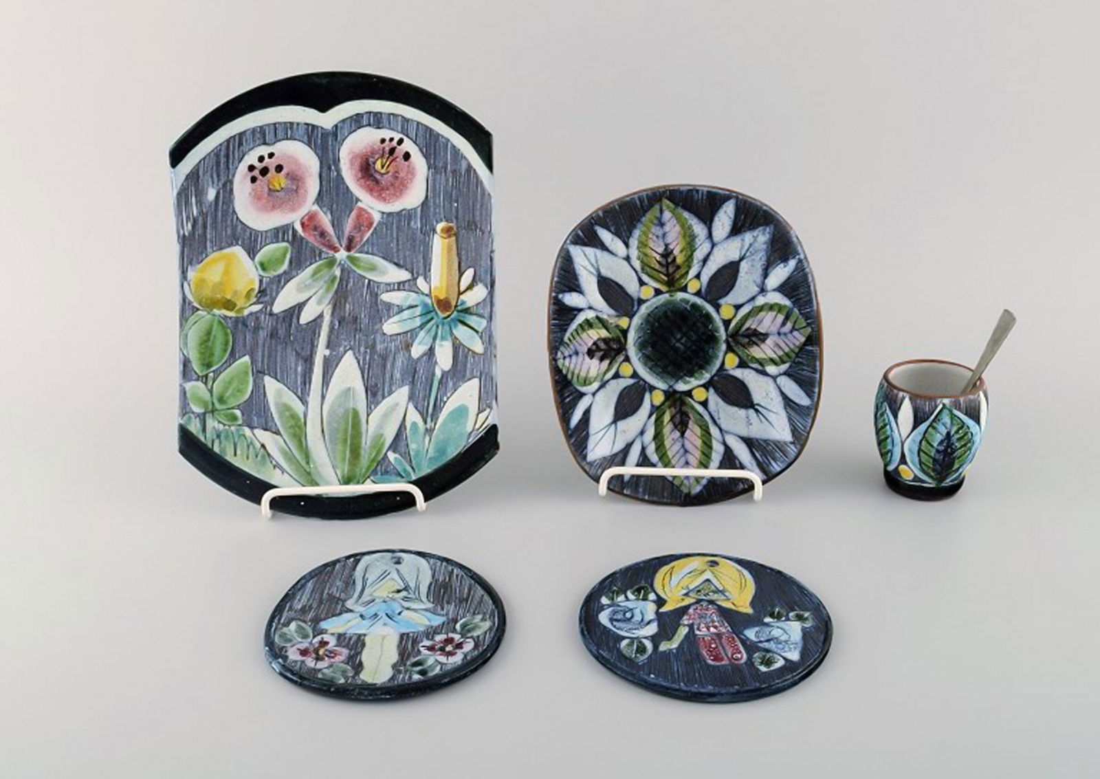 Tilgmans, Sweden. A collection of glazed ceramics decorated with girls and floral motifs. 1960s.: Title: Tilgmans, Sweden. A collection of glazed ceramics decorated with girls and floral motifs. 1960s. Description: Tilgmans, Sweden. A collection of glazed ceramics decorated with girls and floral
