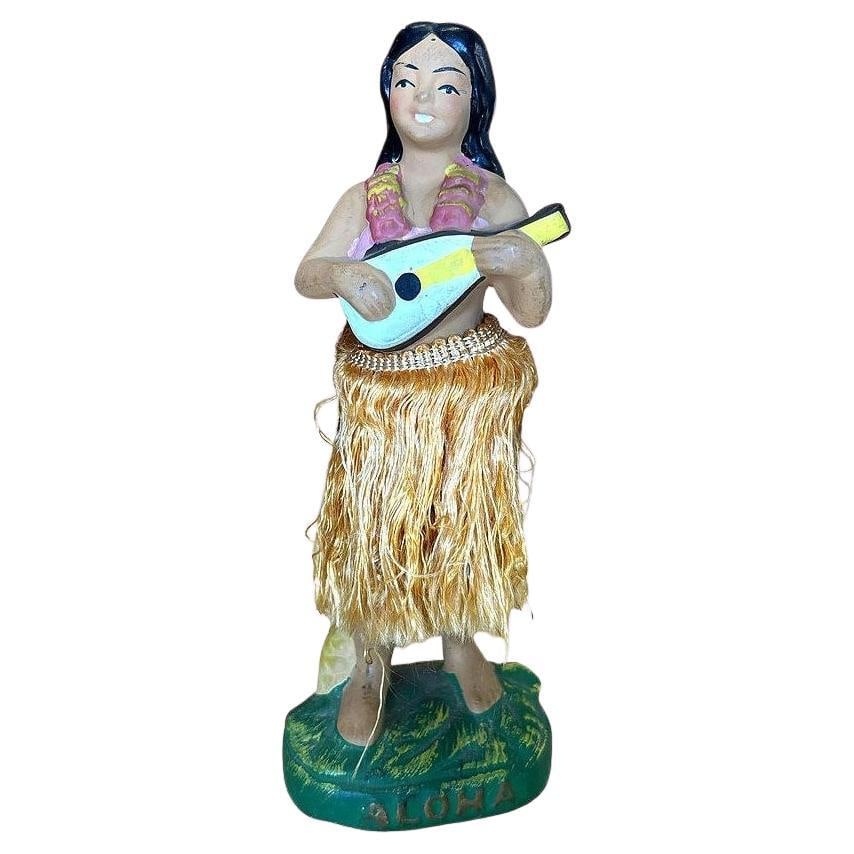 Mid-century Ceramic "Aloha" Hawaiian Dancing Hula Girl w/ Ukulele Figurine: Title: Mid-century Ceramic "Aloha" Hawaiian Dancing Hula Girl w/ Ukulele Figurine Description: Original post-war ceramic chalkware dancing Hawaiian Hula girl figurine made from lightweight plaster and