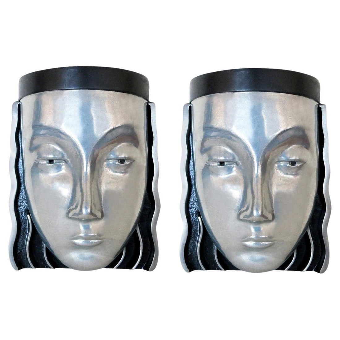 Art Deco Style Female Face Mask Wall Sconce: Title: Art Deco Style Female Face Mask Wall Sconce Description: A pair of Art Deco styled female face mask wall sconces with a signature on the back marked“118 P." The wall sconces resemble the