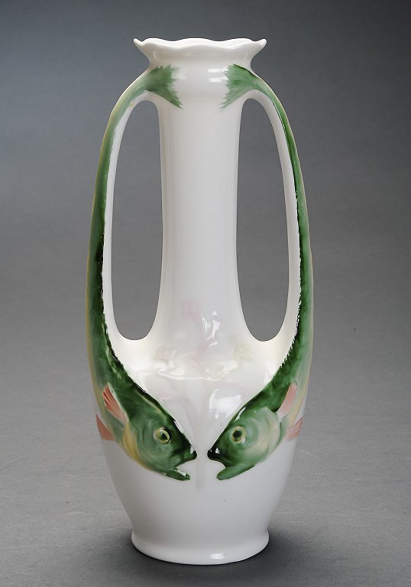 Art Nouveau porcelain vase decorated with two handles in the shape of fish. (1 of 4)