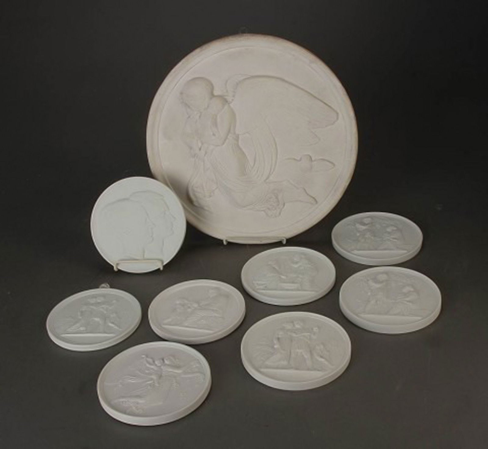 Royal Copenhagen biscuit plates in relief after Thorvaldsen. 8 pcs. in stock.: Title: Royal Copenhagen biscuit plates in relief after Thorvaldsen. 8 pcs. in stock. Description: Royal Copenhagen 8 biscuit plates in relief after Thorvaldsen, diameter 14.5 cm. Plate of plaster in
