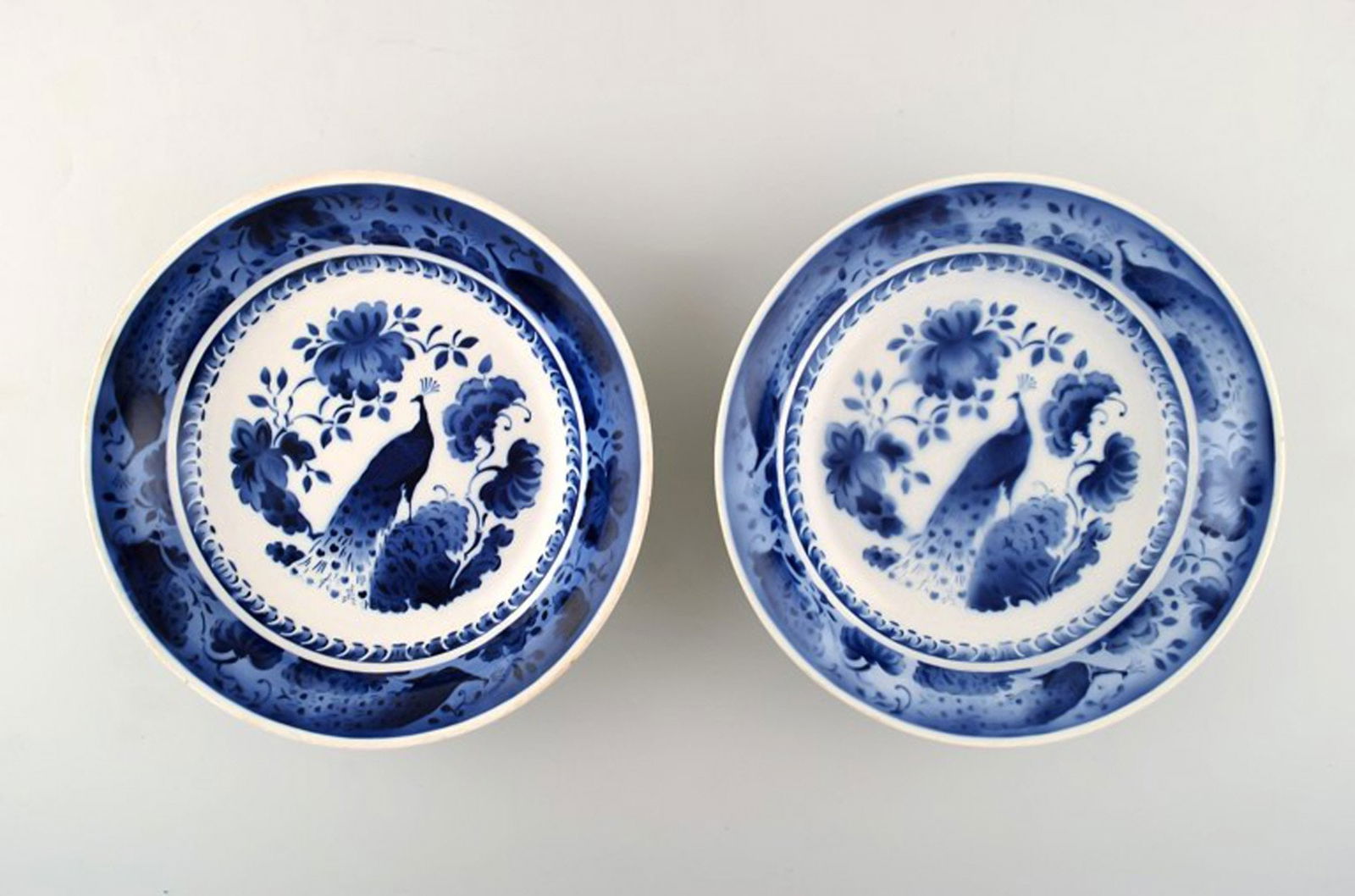 Peacock from Copenhagen's faience factory / Aluminia. Two large bowls in faience.: Title: Peacock from Copenhagen's faience factory / Aluminia. Two large bowls in faience. Description: Peacock from Copenhagen's faience factory / Aluminia. Two large bowls in faience. We have many