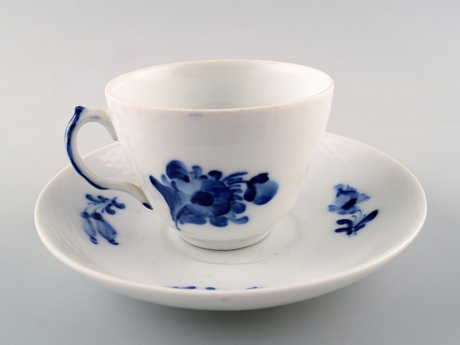Royal Copenhagen blue flower, coffee cup and saucer. Number 10/8040.: Title: Royal Copenhagen blue flower, coffee cup and saucer. Number 10/8040. Description: Royal Copenhagen blue flower, coffee cup and saucer. Number 10/8040. In perfect condition, 1st. factory quality
