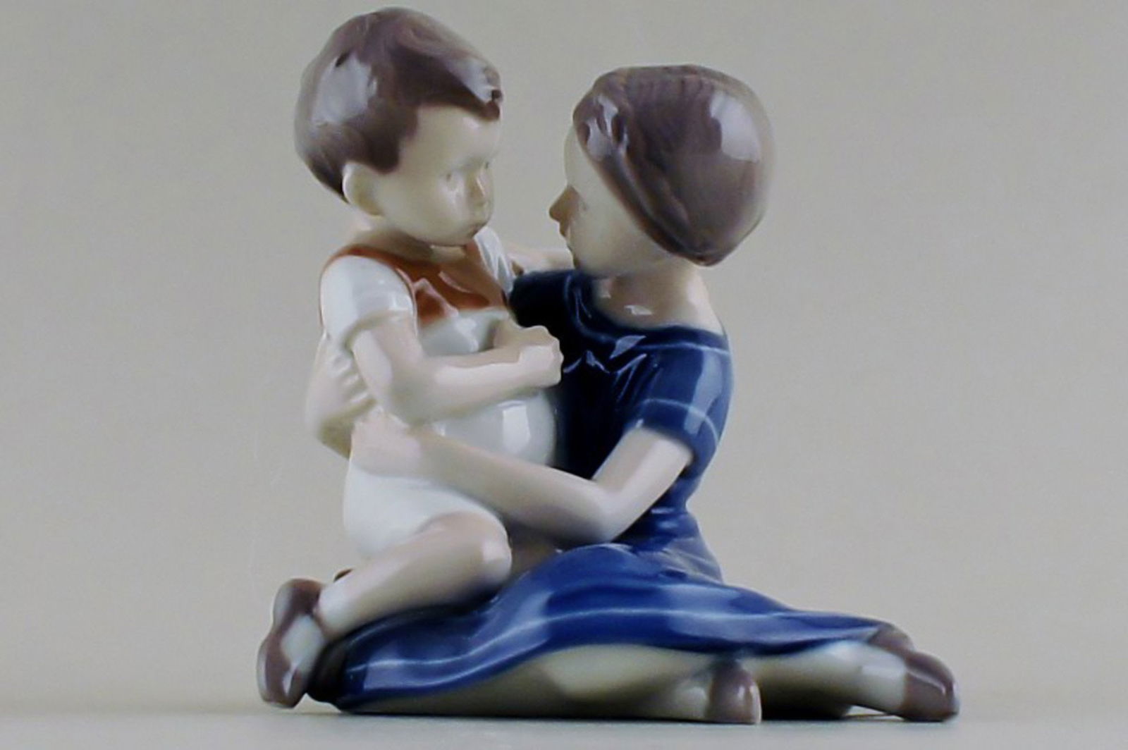 B&G (Bing & Grondahl) mother and boy, number 1568.: Title: B&G (Bing & Grondahl) mother and boy, number 1568. Description: B&G (Bing & Grondahl) mother and boy, number 1568. Early stamp. 14 cm. high. Factory first in good condition. Reserve: $95.00 