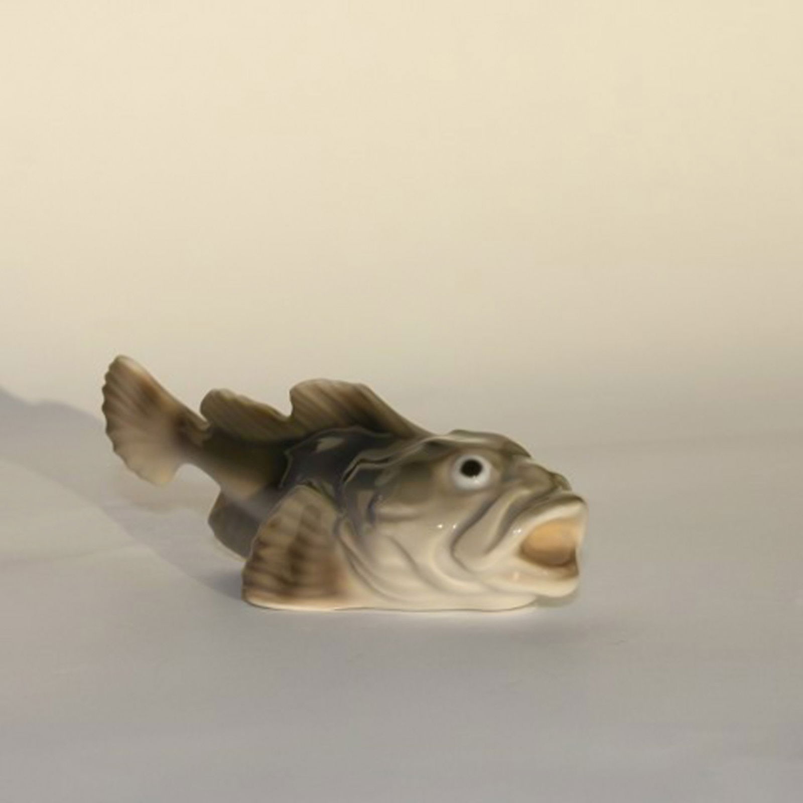 Bing & Grondahl Figurine Sculpin # 2144.: Title: Bing & Grondahl Figurine Sculpin # 2144. Description: Bing & Grondahl Figurine Sculpin # 2144. Measures 9cm. In good condition, factory first. Designed by Svend Jespersen. Reserve: $95.00 