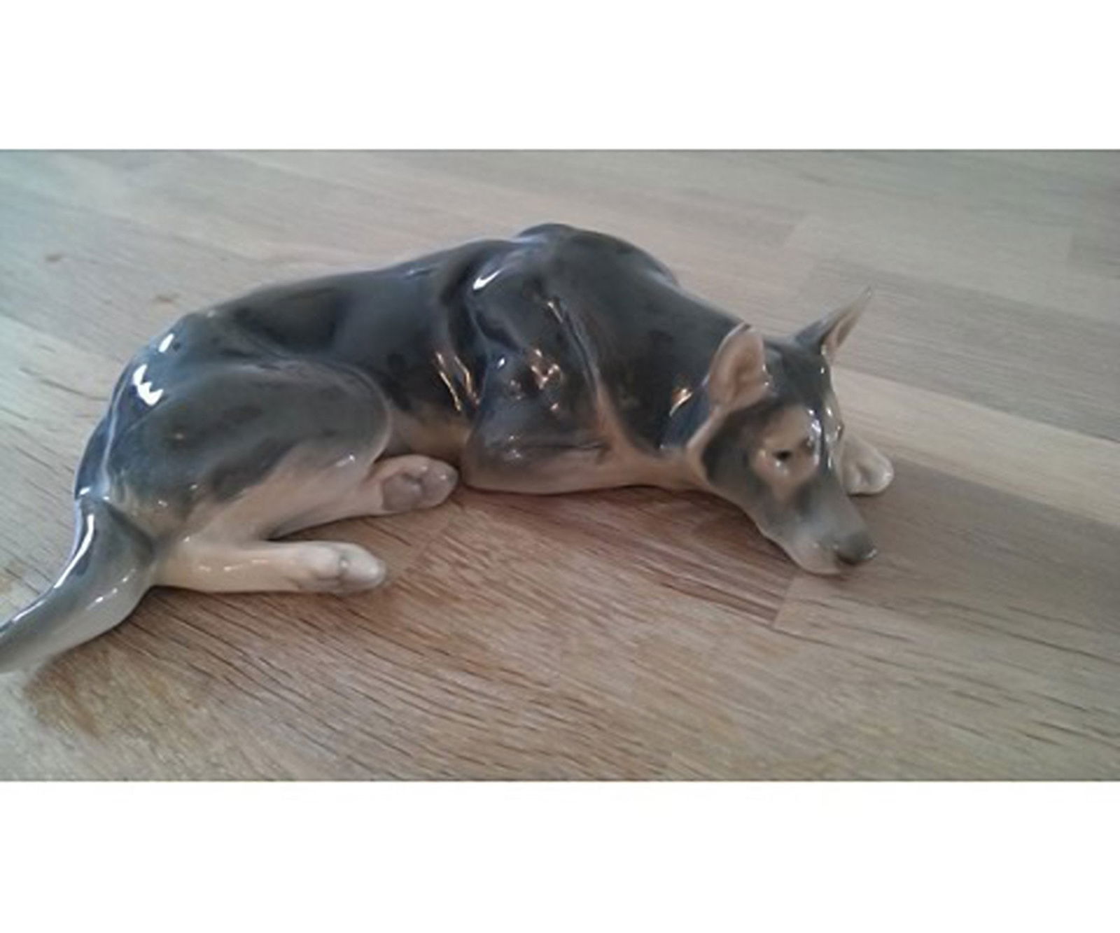 Bing & Grondahl number 1789, German shepherd lying.: Title: Bing & Grondahl number 1789, German shepherd lying. Description: Bing & Grondahl number 1789, German shepherd lying. Design Lauritz Jensen. Factory first quality, good condition. Length: 24