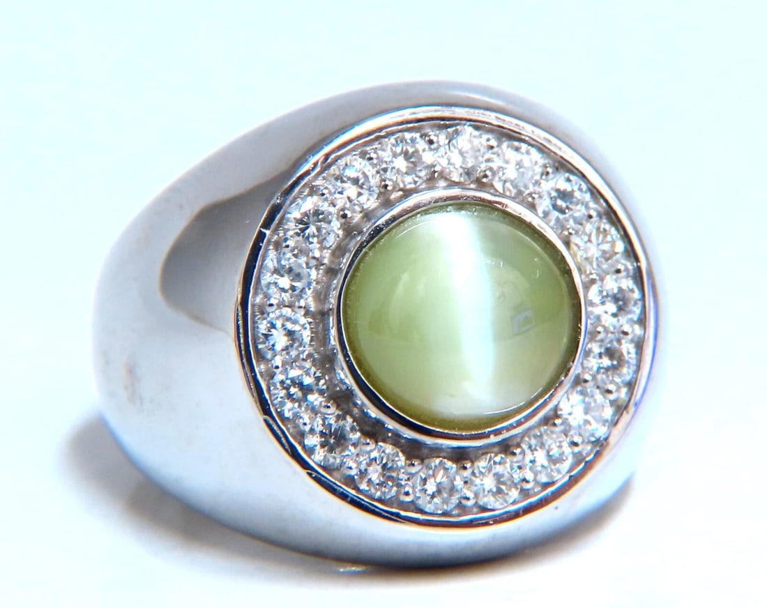 GIA Certified 4.78ct Natural Chrysoberyl Cats Eye Mens Diamond Signet Ring 14kt: Title: GIA Certified 4.78ct Natural Chrysoberyl Cats Eye Mens Diamond Signet Ring 14kt Description: GIA Certified: Natural Chrysoberyl Cats Eye ring. Cabochon cut, Clean Clarity 4.78ct Brilliant