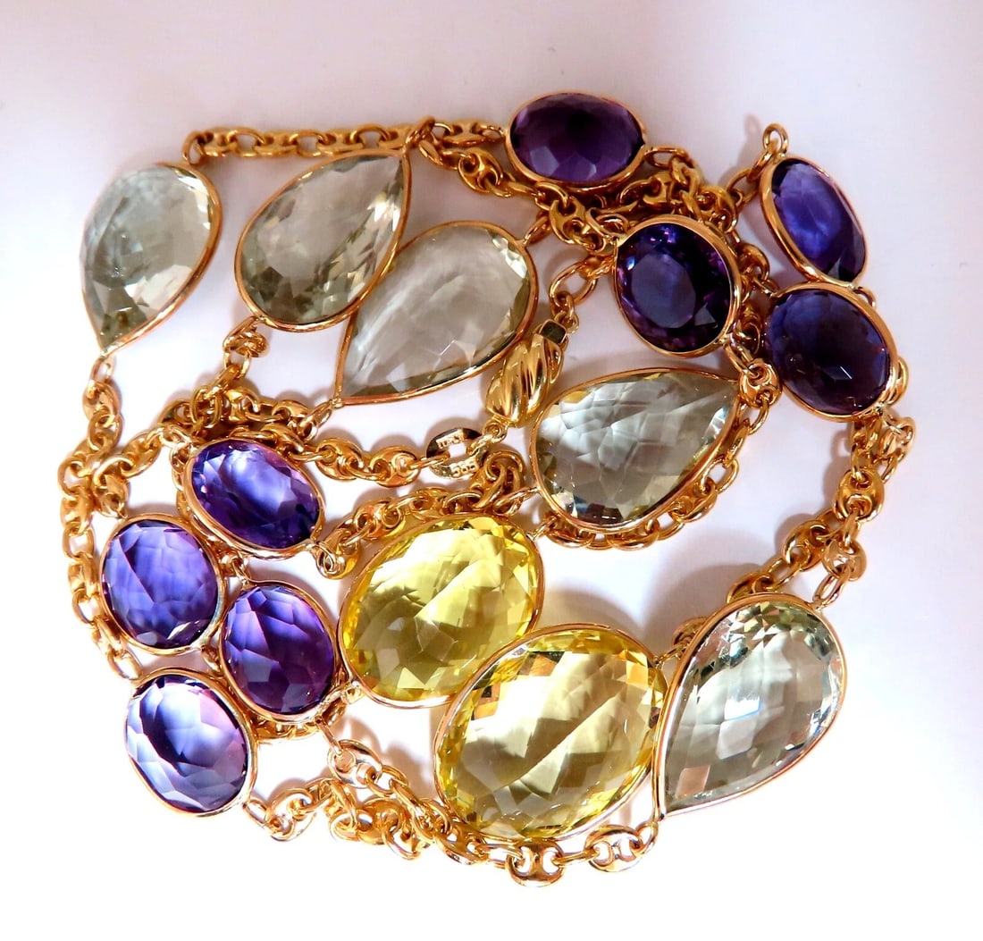 150ct natural purple green amethyst necklace 14kt Gold**: Title: 150ct natural purple green amethyst necklace 14kt Gold** Description: 150ct. Natural amethyst Bead necklace Yellow Topaz: 18 x 14mm Smaller yellow topaz 15 x 11mm Green Pear Shape Amethyst: 16