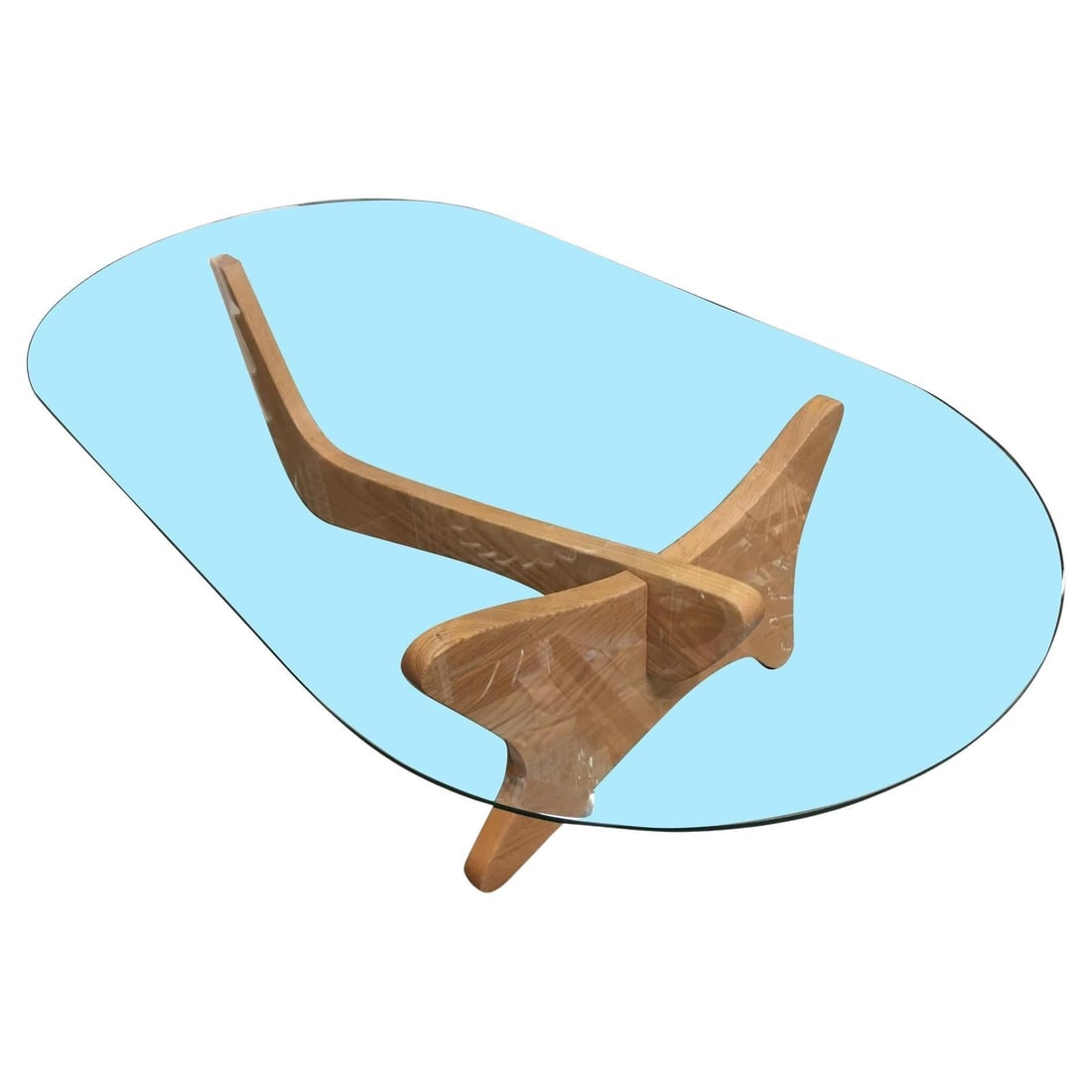 Mid-Century Modern Noguchi Style Oval Glass Coffee Table: Title: Mid-Century Modern Noguchi Style Oval Glass Coffee Table Description: This 1950s biomorphic coffee table, in the style of Isamu Noguchi, was nicknamed the "Airplane Table," for its interlocking