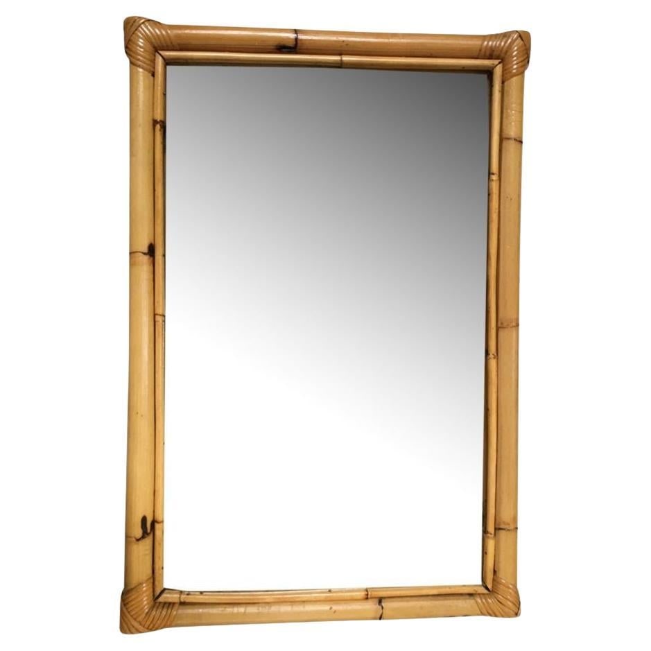 Restored Long Two-Strand Rattan Wall Mirror W/ Stick Reed Rattan Border: Title: Restored Long Two-Strand Rattan Wall Mirror W/ Stick Reed Rattan Border Description: This beautifully restored Frankl-style rectangular rattan mirror features a single-strand rattan frame with