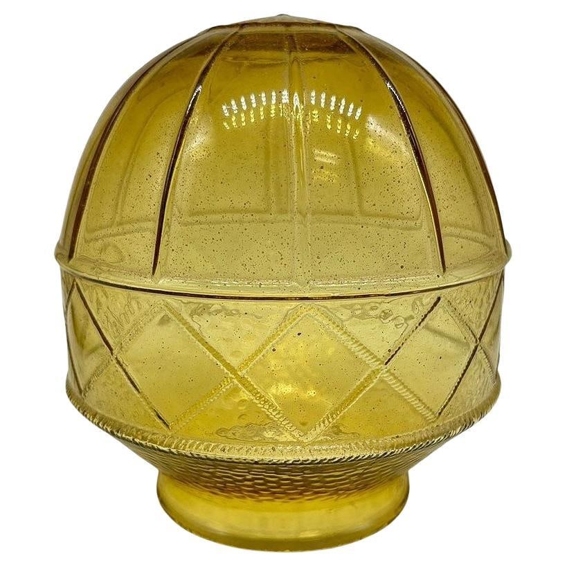 Modern Mediterranean Style Yellow Amber Glass Globe w/ 3 1/4 Fitter: Title: Modern Mediterranean Style Yellow Amber Glass Globe w/ 3 1/4 Fitter Description: Mid-century Mediterranean style yellow hand-blown amber glass globe features an Acorn shape with a cross
