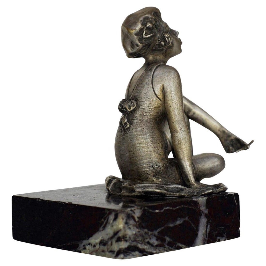 Art Deco Nickel Plate Smoking Flapper on Marble Base: Title: Art Deco Nickel Plate Smoking Flapper on Marble Base Description: This Art Deco nickel plate features the statue of a young flapper smoking a cigarette; the statue is fixed to a black marble