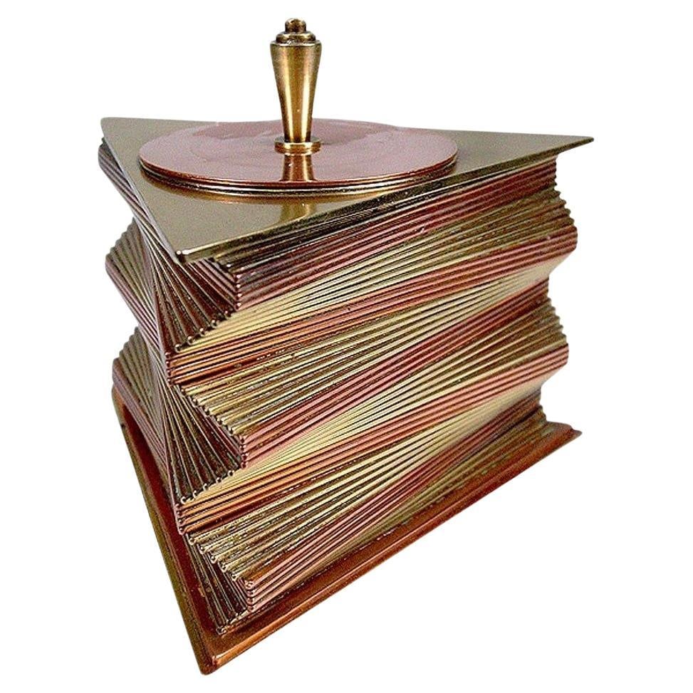 Otar Stacked Brass and Copper Box: Title: Otar Stacked Brass and Copper Box Description: This rare 1935 all-original decorative box was designed and produced by John Otar in California. The box features individual triangular brass and