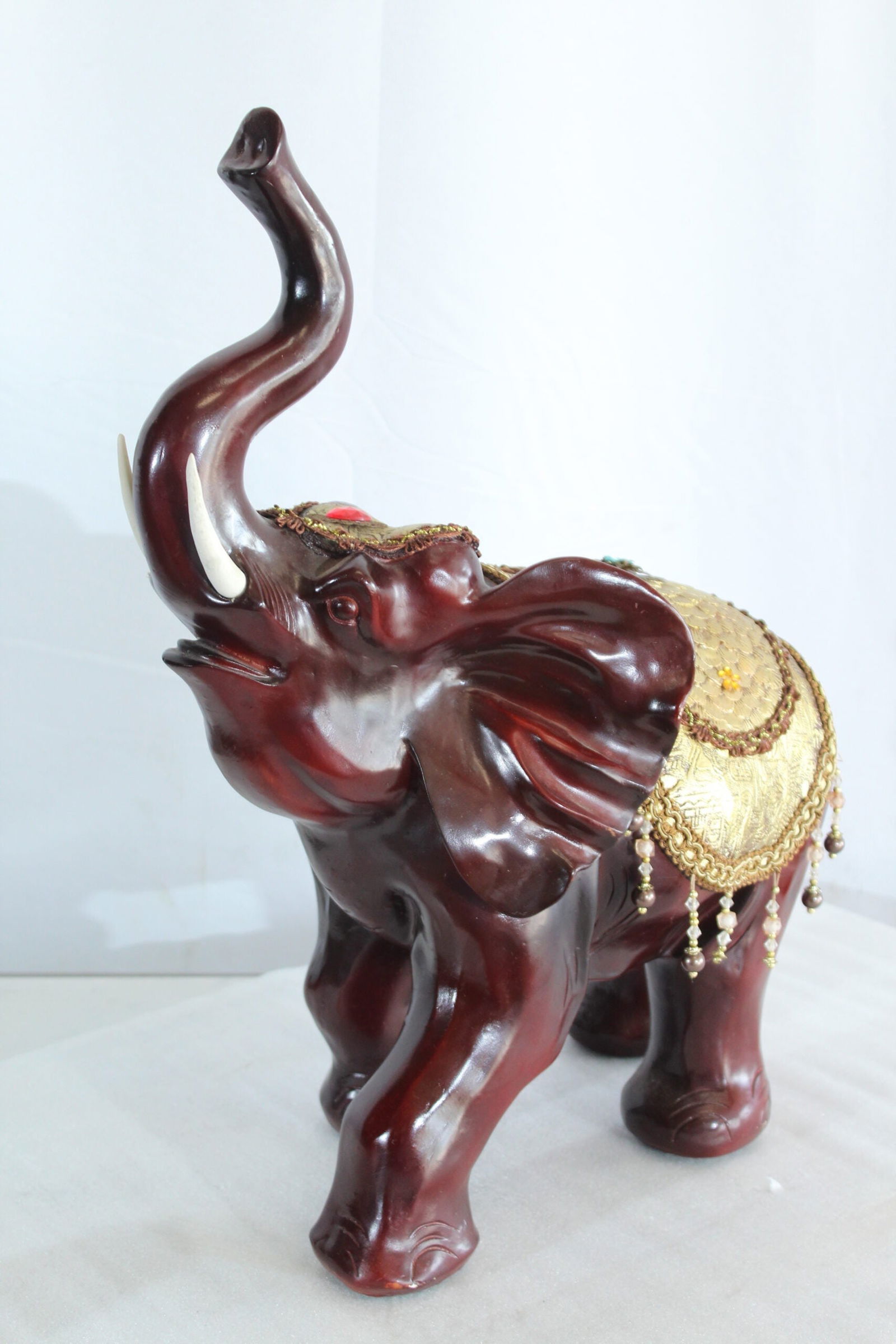 Resin Elephant Statue with Gold Saddle and Raised Trunk - Regal Lucky Elephant Home Decor - 19" x - 12