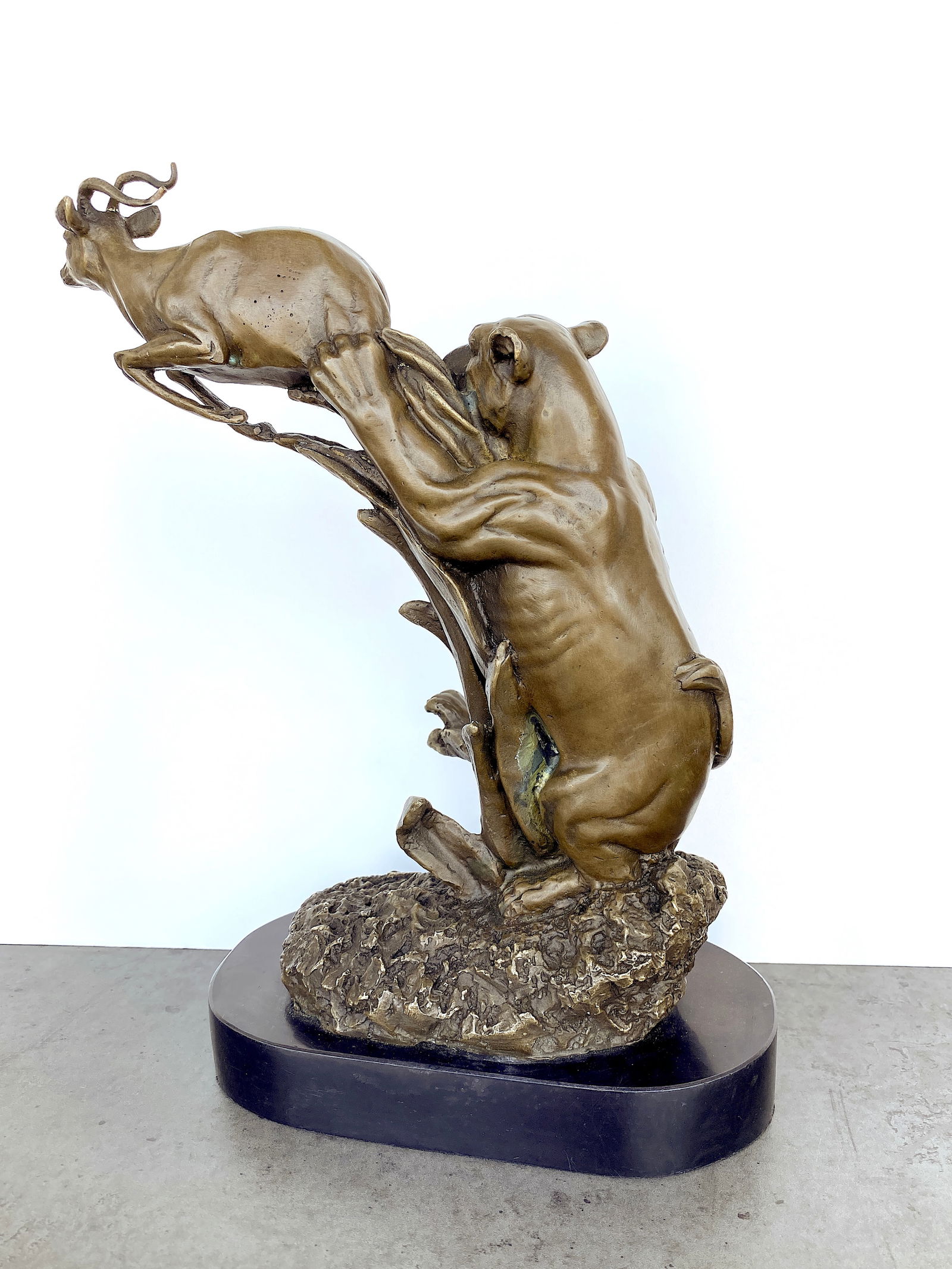 sign. Bronze Lioness hunting an antelope - 2
