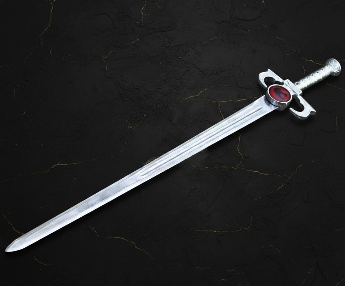 Thundercats Sword of Omens Replica, Handmade Stainless Steel Blade with Lion Symbol: Title:Thundercats Sword of Omens Replica, Handmade Stainless Steel Blade with Lion SymbolDescription:This listing is for a masterfully crafted replica of the iconic Sword of Omens. Inspired by the