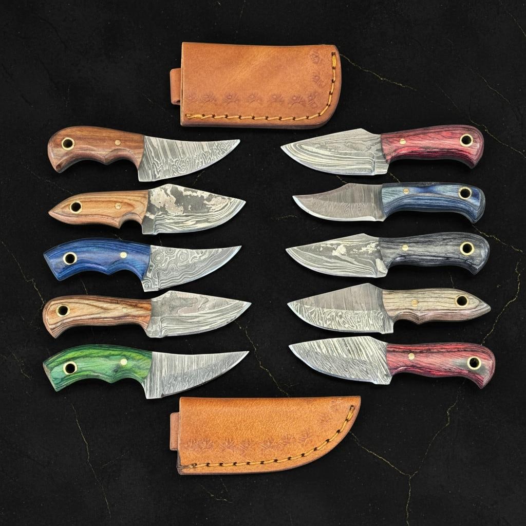 Lot of 10 Hand Forged Damascus Steel Skinner Knives with Pakka Wood Handles: Title:Lot of 10 Hand Forged Damascus Steel Skinner Knives with Pakka Wood Handles Description:This listing is for a lot of 10 hand-forged Damascus steel hunting knives, ideal for collectors and outdoo