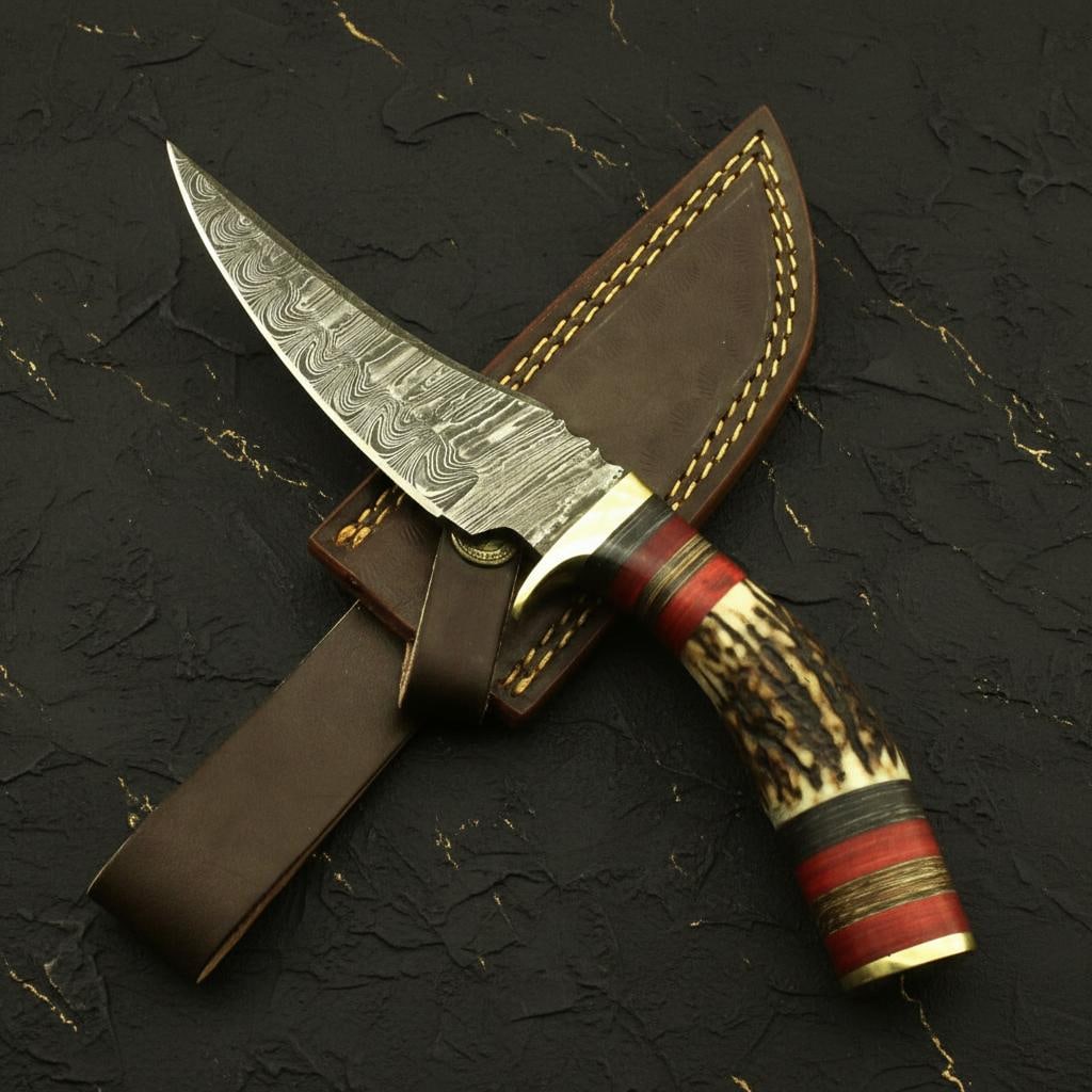 Hand Forged Damascus Steel Hunting Knife with Genuine Stag Antler Handle: Title:Hand Forged Damascus Steel Hunting Knife with Genuine Stag Antler Handle Description:Discover this expertly crafted fixed blade hunting knife, featuring a robust, hand forged Damascus steel blad