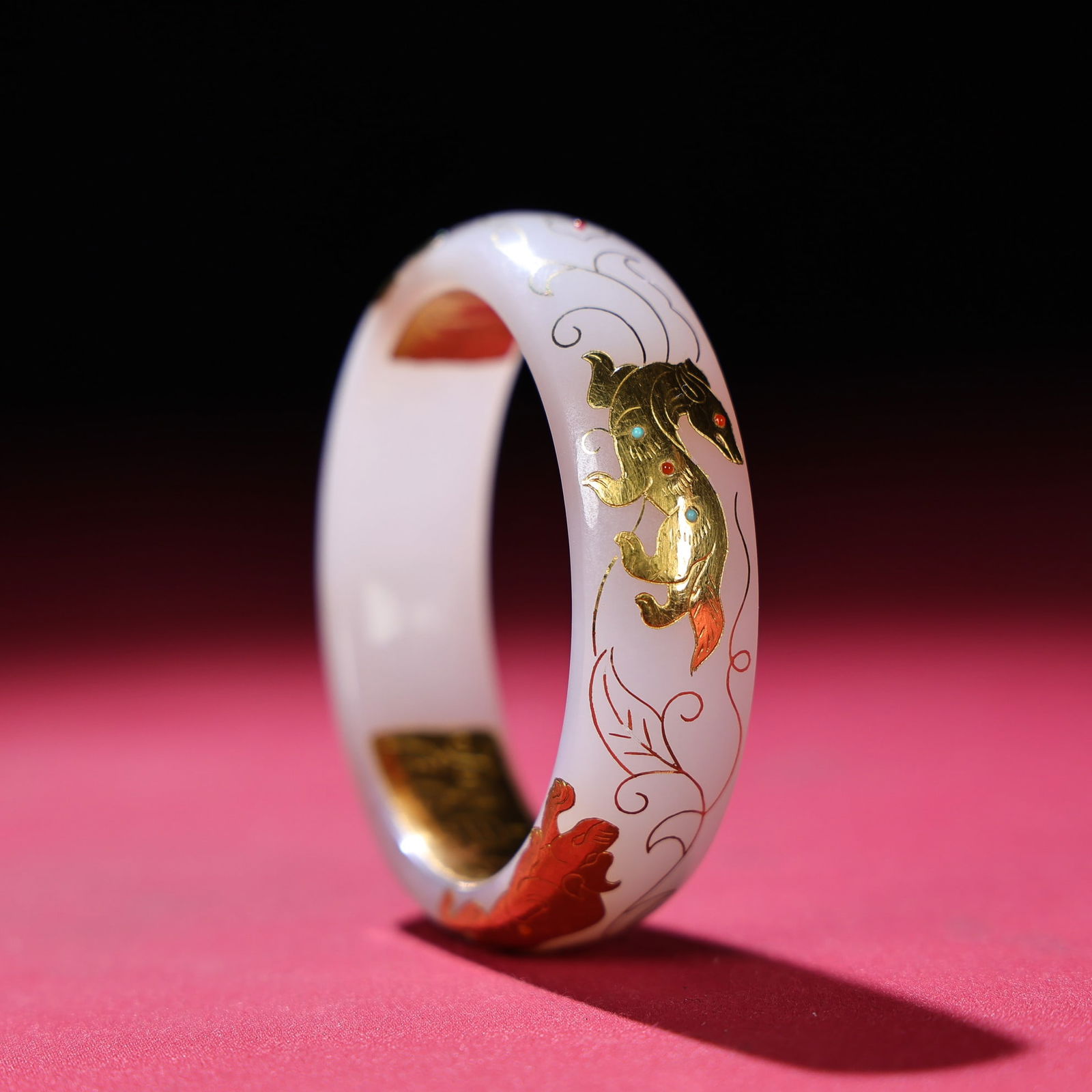 Inside Diameter 54mm Hetian jade inlay Gold,Silver Wire & Gem Bracelet: Title: Inside Diameter 54mm Hetian jade inlay Gold,Silver Wire & Gem Bracelet Origin: Chinese Date/Period: After1900 Materials: Hetian jade,Gold,Silver Wire,Gem Dimensions: 67x15x7(mm)
