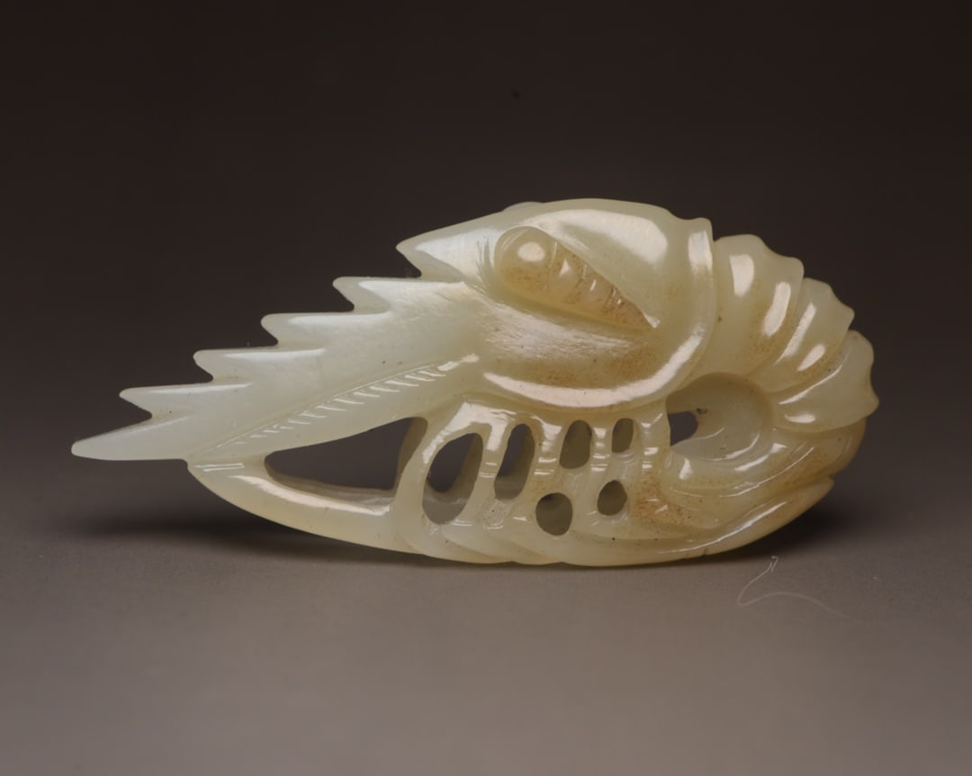 Hetian Jade Hand-carved Pendant - Lobster: Title: Hetian Jade Hand-carved Pendant - Lobster Origin: Chinese Date/Period: After1900 Materials: Hetian Jade Dimensions: 70x30x12(mm) 2.76x1.18x0.47(inches) Weight 0.06 lbs/27g Reserve: $88.00 