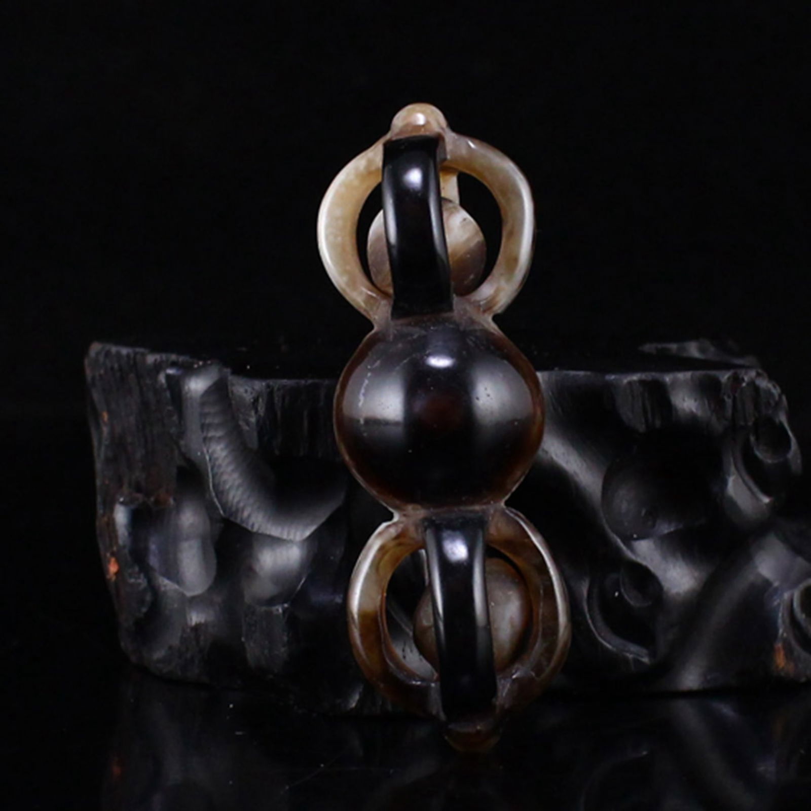 Tibetan DZI Agate Pendant: Title: Tibetan DZI Agate Pendant Origin: Date/Period: Materials: DZI Agate Dimensions: 56x19x19(mm) 2.20x0.75x0.75(inches) Weight 0.04 lbs/17g Reserve: $49.00 Shipping:Domestic: Shipping rates