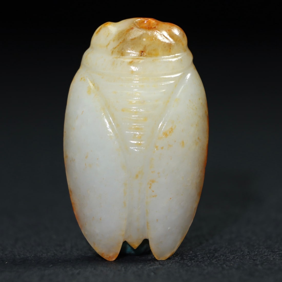 Hetian Jade Pendant - Cicada: Title: Hetian Jade Pendant - Cicada Origin: Chinese Date/Period: After1910 Materials: Hetian Jade Dimensions: 58x34x15(mm) 2.28x1.34x0.59(inches) Weight 0.08 lbs/39g Reserve: $220.00 