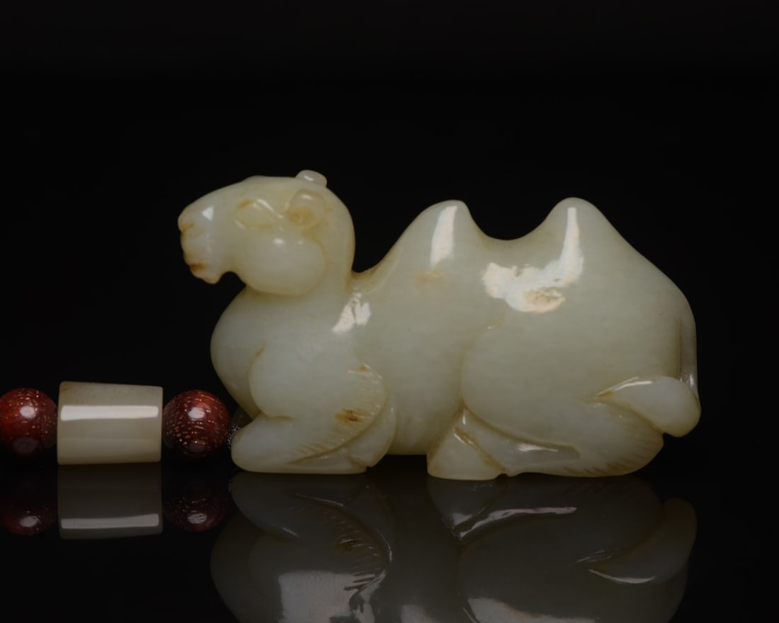 Hetian Jade Pendant - Camel: Title: Hetian Jade Pendant - Camel Origin: Chinese Date/Period: After1900 Materials: Hetian Jade Dimensions: 60x33x18(mm) 2.36x1.30x0.71(inches) Weight 0.13 lbs/61g Reserve: $120.00 Shipping: Domesti