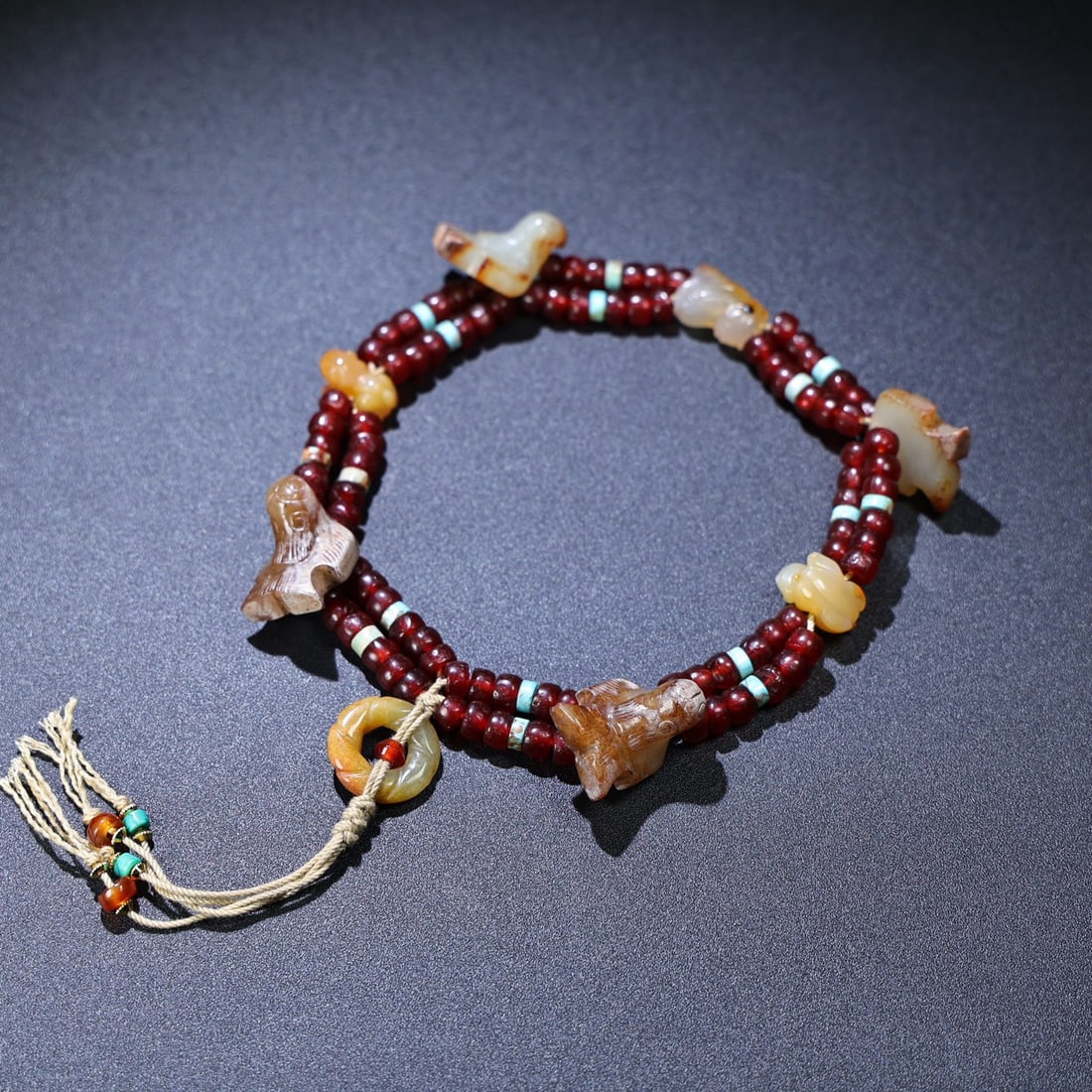 Hand knitting Red Agate,Hetian Jade,Turquoise Chain: Title: Hand knitting Red Agate,Hetian Jade,Turquoise Chain Origin: Chinese Date/Period: After1850 Materials: Red Agate,Hetian Jade,Turquoise Dimensions: 23x20x20(mm) 0.91x0.79x0.79(inches) Weight