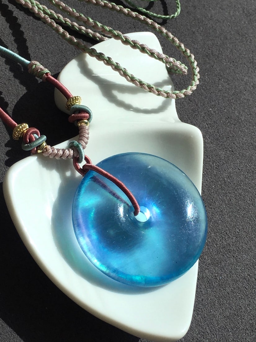 Natural Aquamarine Lucky Pendant with Certificate: Title: Natural Aquamarine Lucky Pendant with Certificate Origin: Chinese Date/Period: After2020 Materials: Aquamarine Dimensions: 35x8.8(mm) 1.38x0.35(inches) Weight 0.04 lbs/20.22g Reserve: $468.00 S