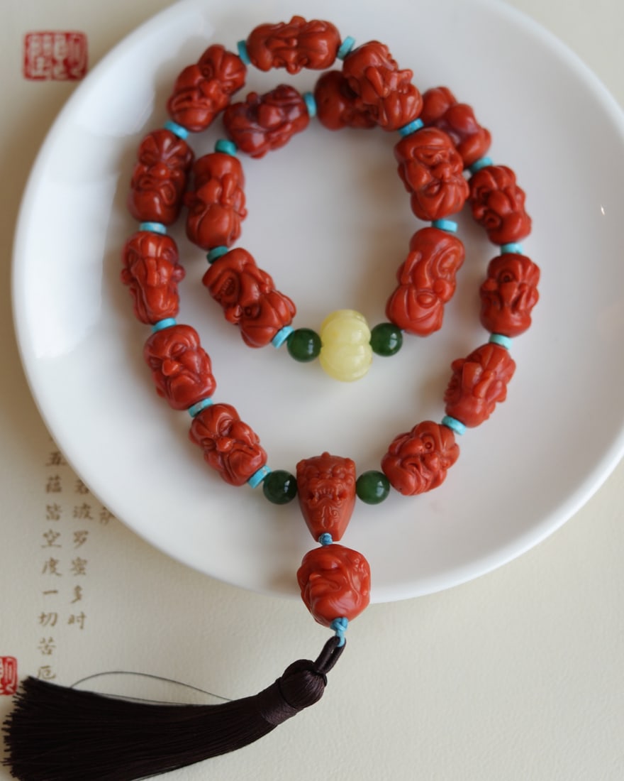 Nanhong Agate Hand-Carved Eighteen Arhat Hand Chain: Title: Nanhong Agate Hand-Carved Eighteen Arhat Hand Chain Origin: Chinese Date/Period: After2020 Materials: Nanhong Agate Dimensions: 16(mm) 0.63(inches) Reserve: $999.00 Shipping: Domestic: Shipp