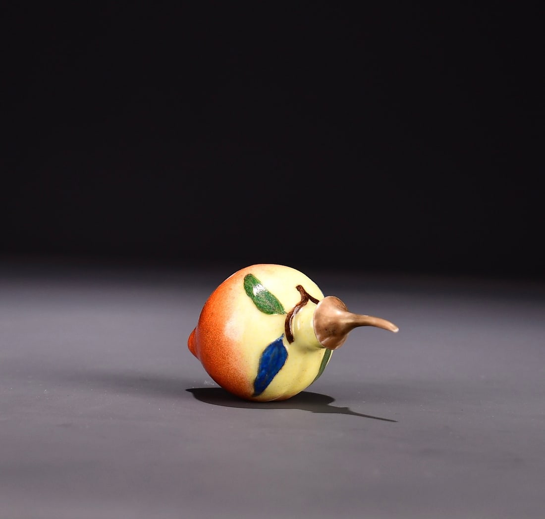 Famille Rose Porcelain Peach Snuff Bottle: Title: Famille Rose Porcelain Peach Snuff Bottle Origin: Chinese Date/Period: After1910 Materials: Porcelain Dimensions: 80x50(mm) 3.15x1.97(inches) Reserve: $88.00 Shipping:Domestic: Shipping